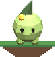 A small green Mossling standing on a floating island